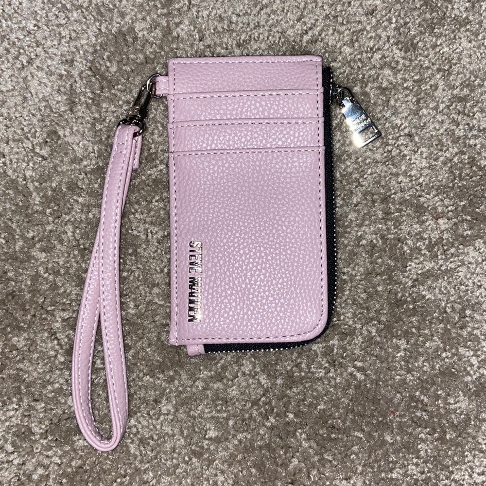 Steven Madden wallet with multiple compartments. Never used. Color is Lavender